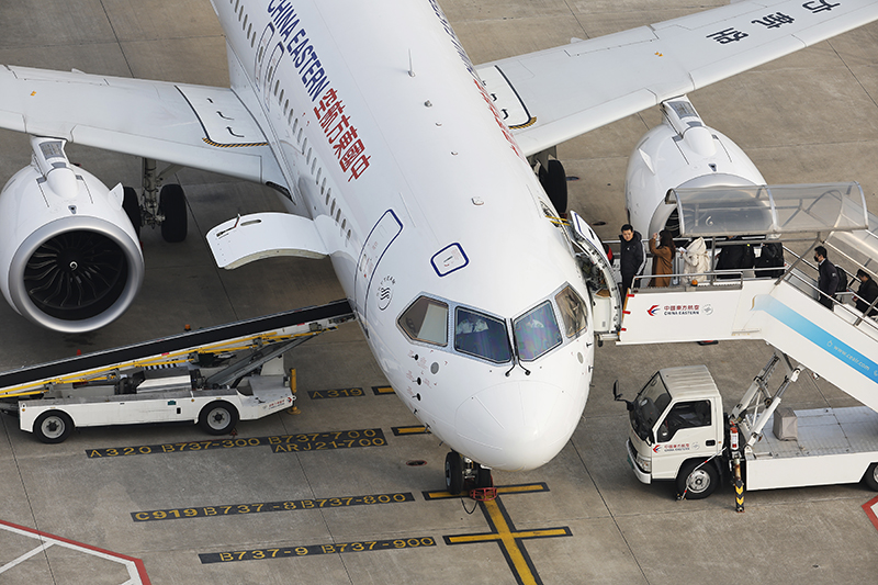 Passengers are boarding a China Eastern Airlines’ C919 plane departing Shanghai on Jan. 9, 2024.