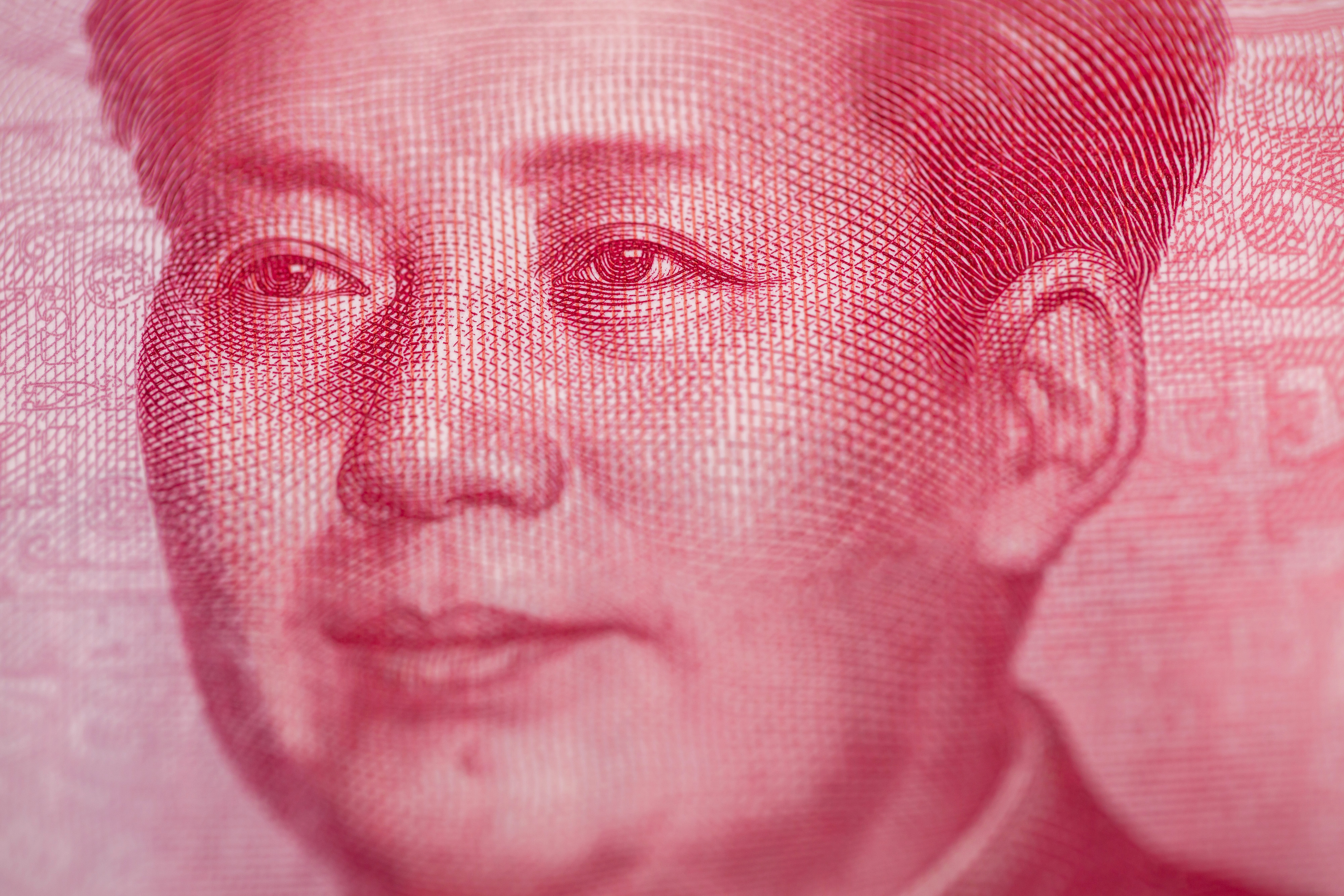 The People’s Bank of China set the so-called yuan fixing at 7.1192 per dollar on Thursday, an increase of 33 ticks, the most in about two months. Photo: Bloomberg