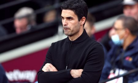Arsenal manager Mikel Arteta watches on