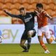 Sheffield Wednesday defender Reece James playing for Blackpool