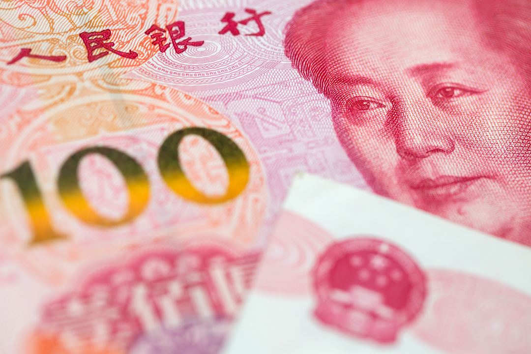 The onshore yuan was little changed at 7.2610 per dollar, while its offshore peer gained 0.1% to 7.2862